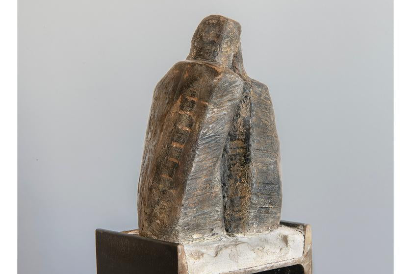 Luz Tisera — sculpture in iron and carved stone
