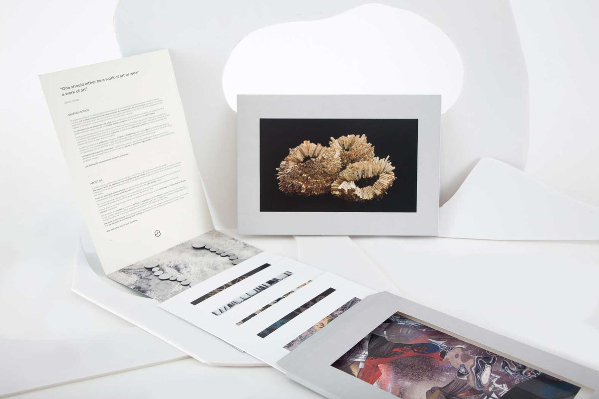 Iskin Sisters packaging with the art prints by the artists
