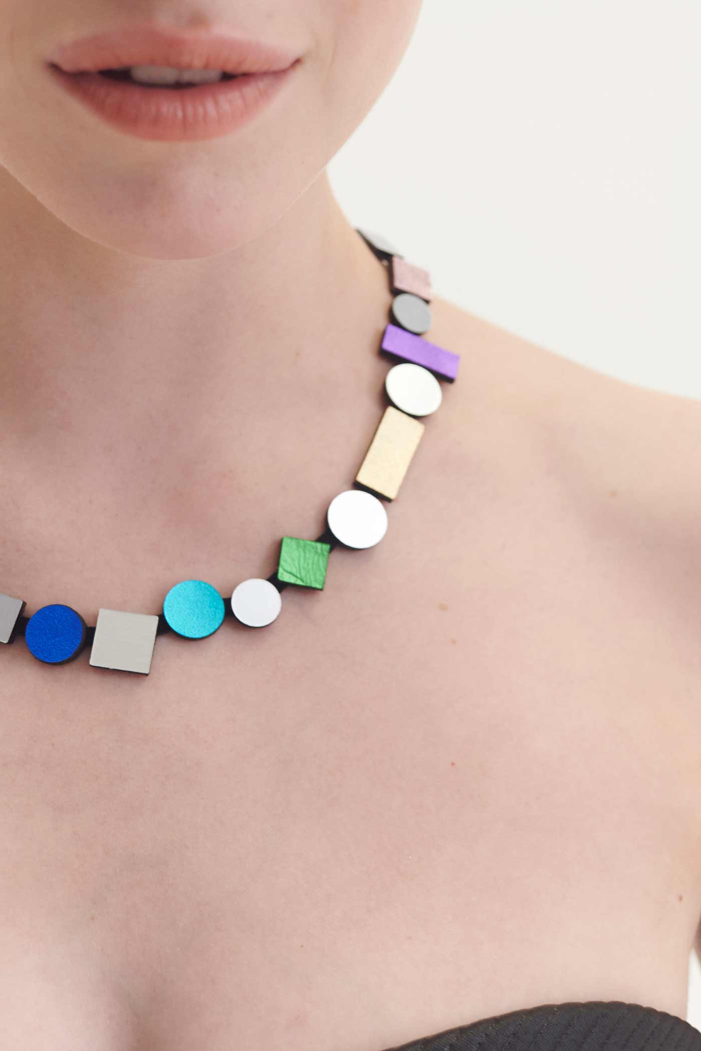 Multicolor painted acrylic round necklace from the Bauhaus collection by Iskin Sisters, Argentina