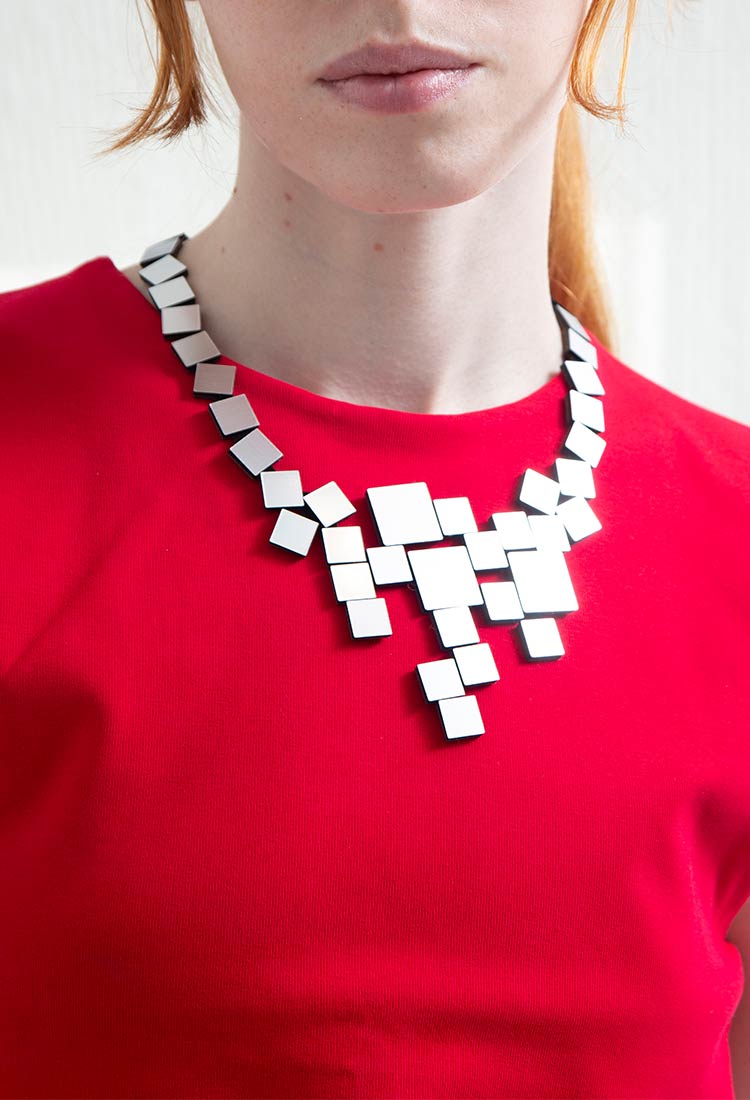 Bauhaus V Necklace Squares by Iskin Sisters in silver metallic acrylic and hand-cut leather