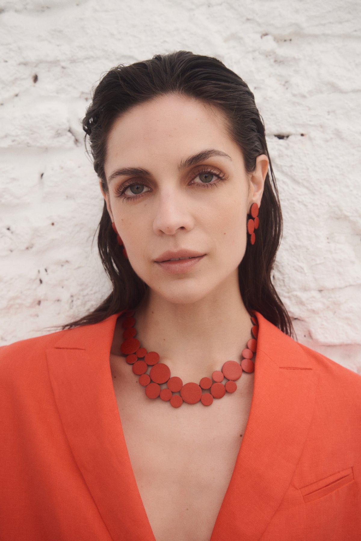 Abstraction small necklace in red Argentine leather and acrylic, by Iskin Sisters