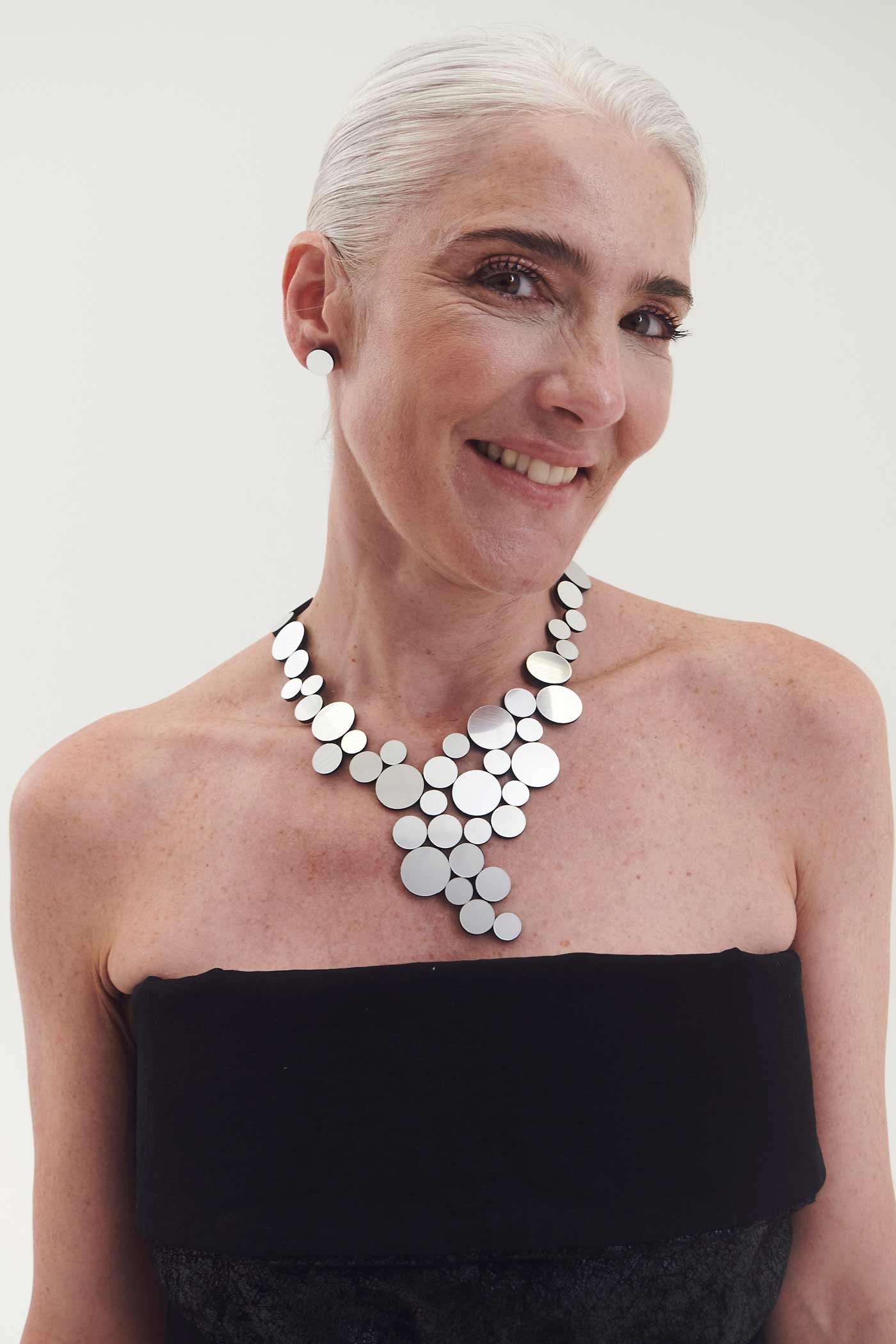 Sculptural silver circles necklace from the Abstraction collection, Iskin Sisters