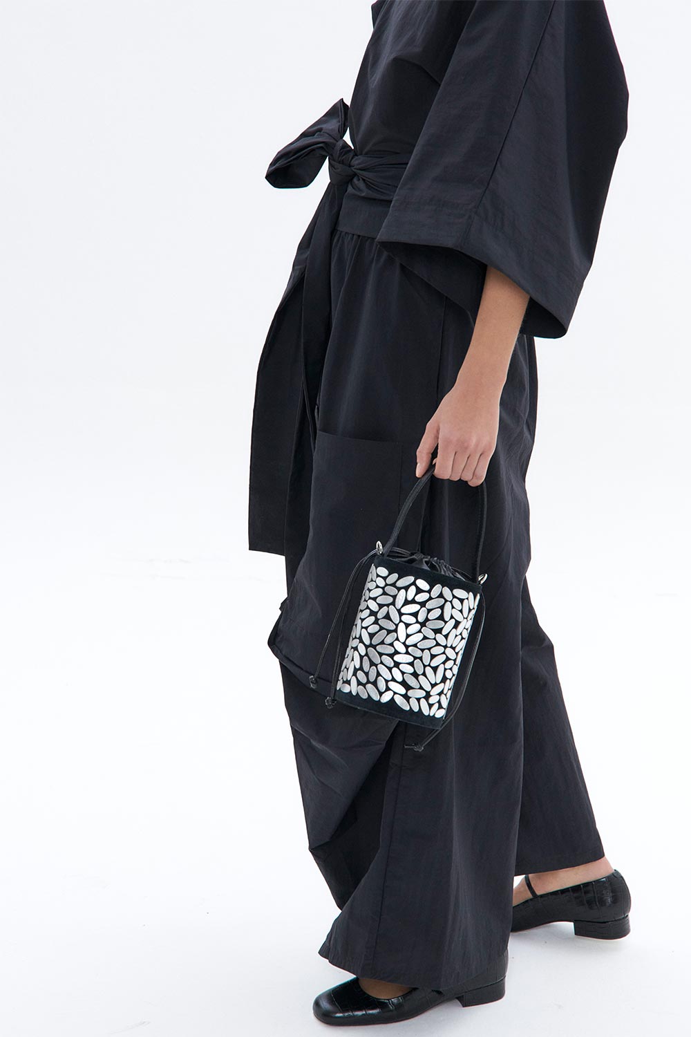 Contemporary silver leather bucket bag handmade by Iskin Sisters in their Buenos Aires atelier