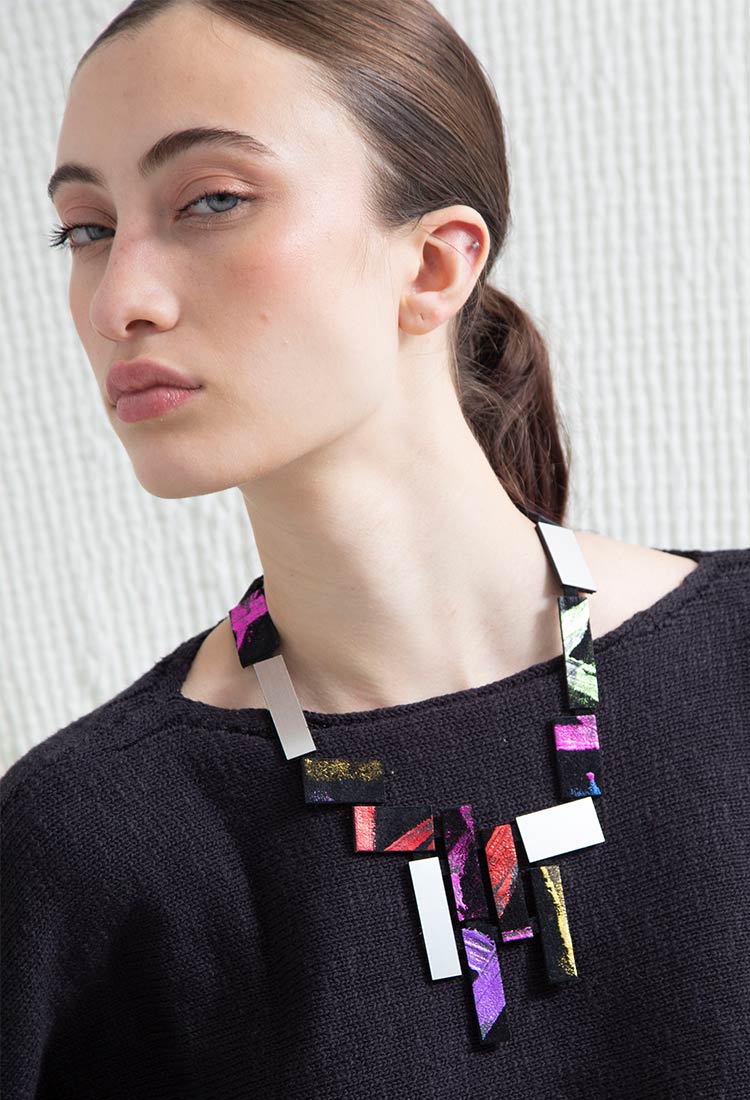 Klee V Necklace by Iskin Sisters in silver, black and rainbow painted acrylic on hand-cut leather