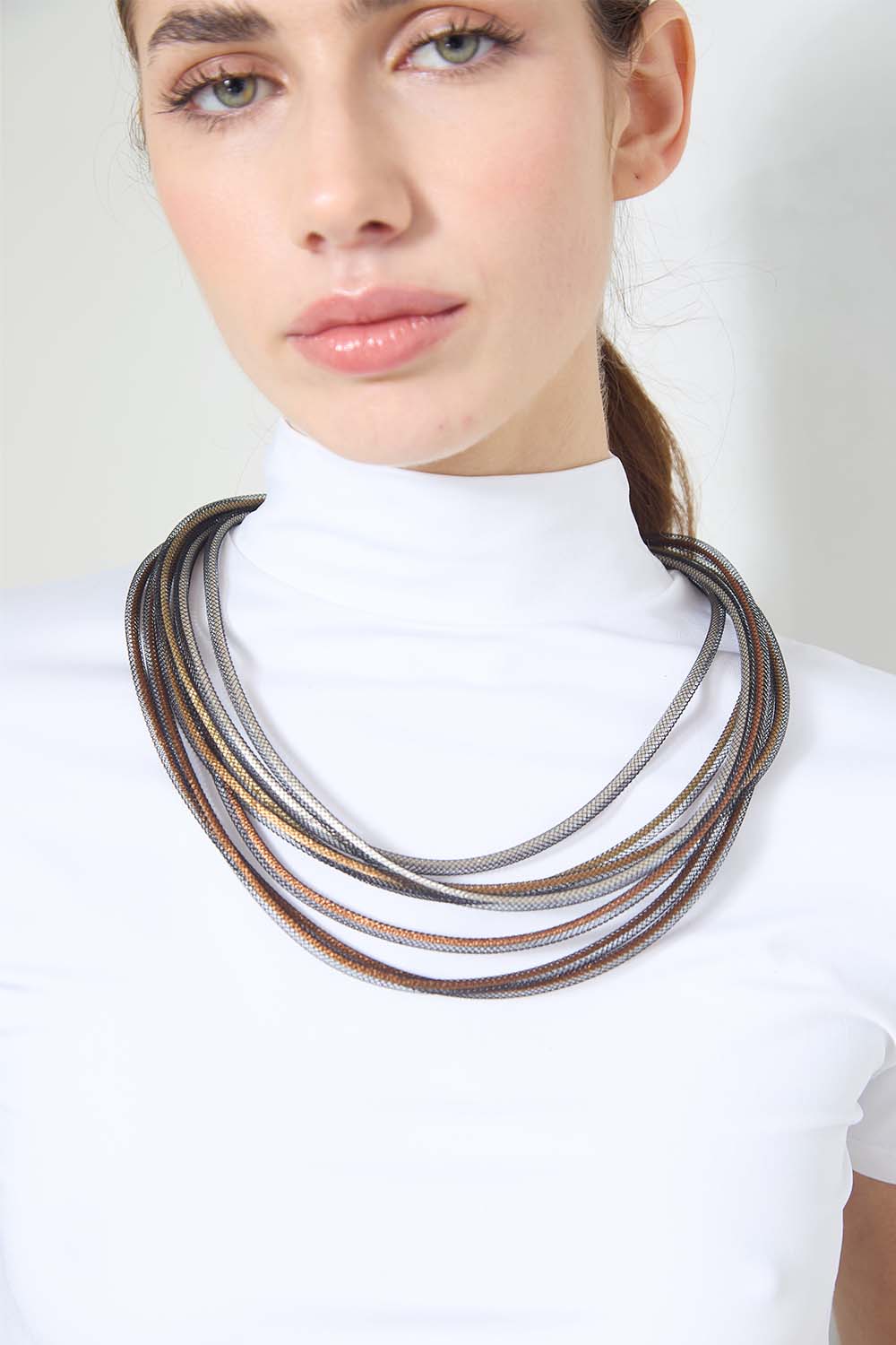 Metallic textile cord round necklace from the Life collection by Iskin Sisters, Buenos Aires