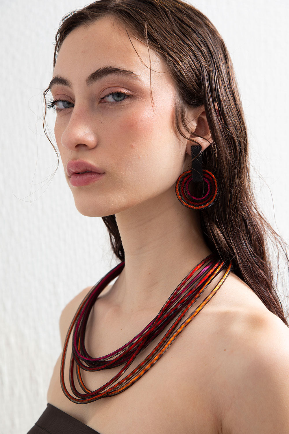 Life round necklace in red and pink, handmade in our Buenos Aires atelier
