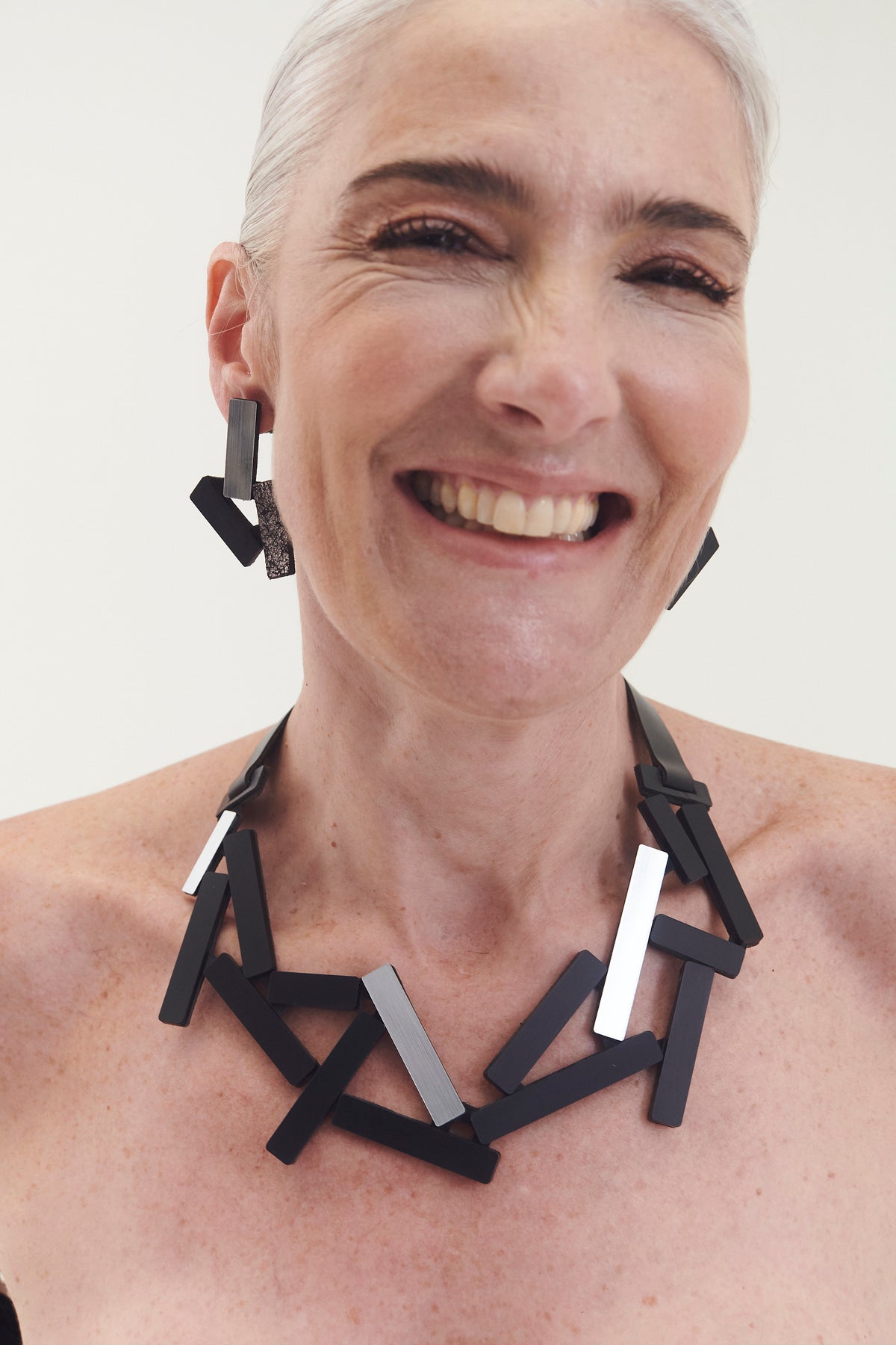 Large silver and black acrylic statement necklace from the Ray collection by Iskin Sisters