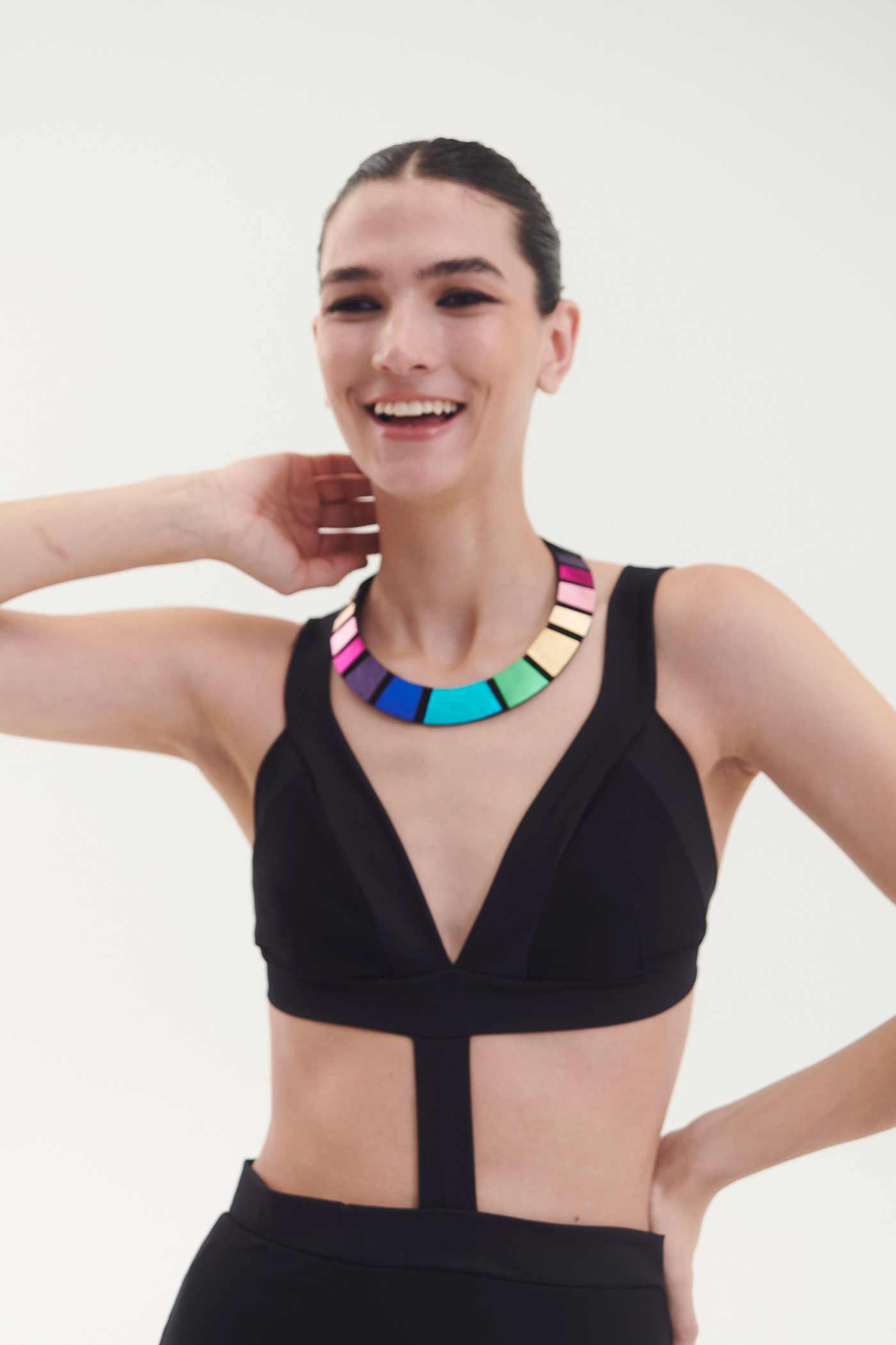 Round leather bib necklace in rainbow colors, contemporary design by Iskin Sisters, Argentina