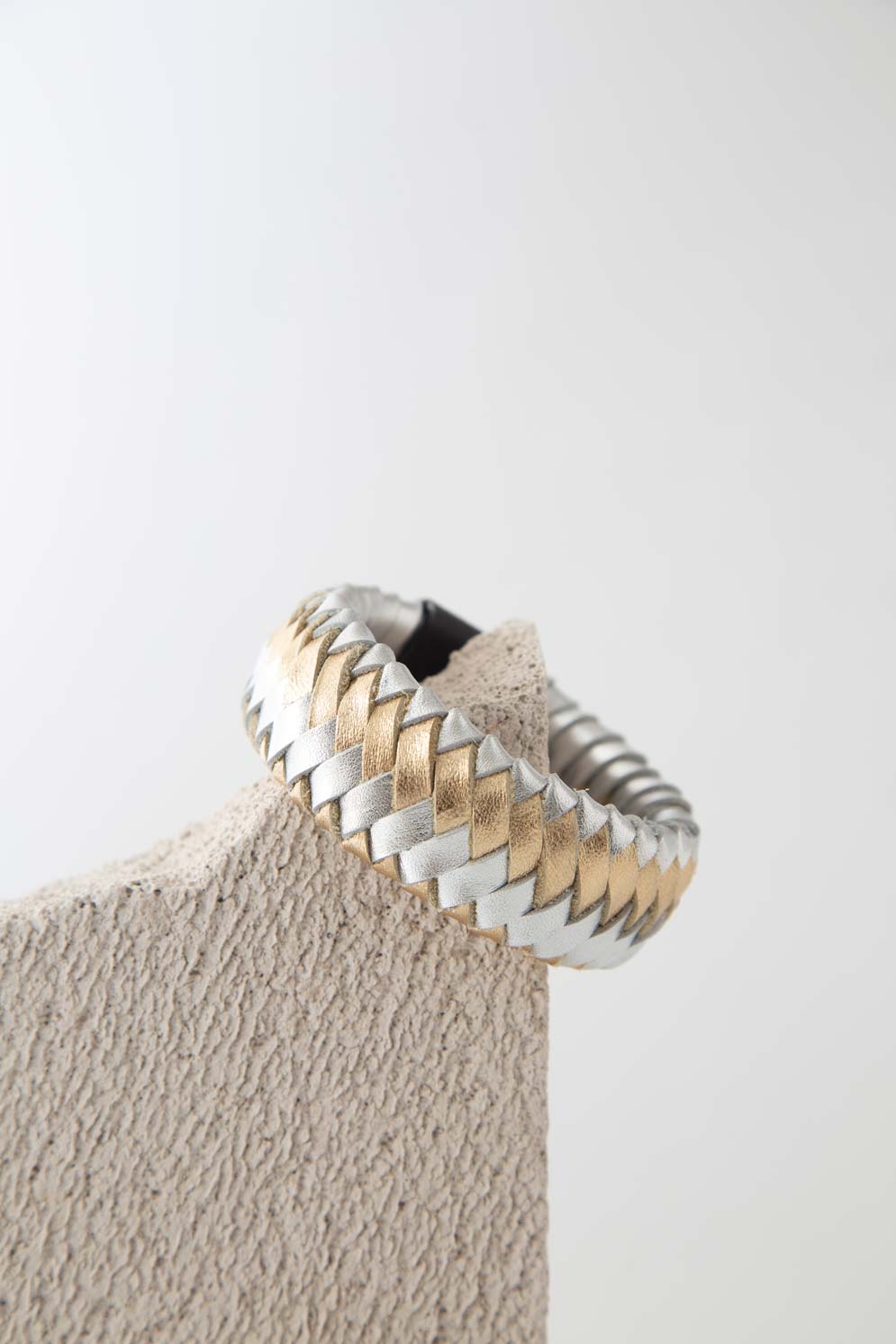 Rainbow Bracelet Woven by Iskin Sisters in silver and gold hand-woven hand-cut leather, Argentina
