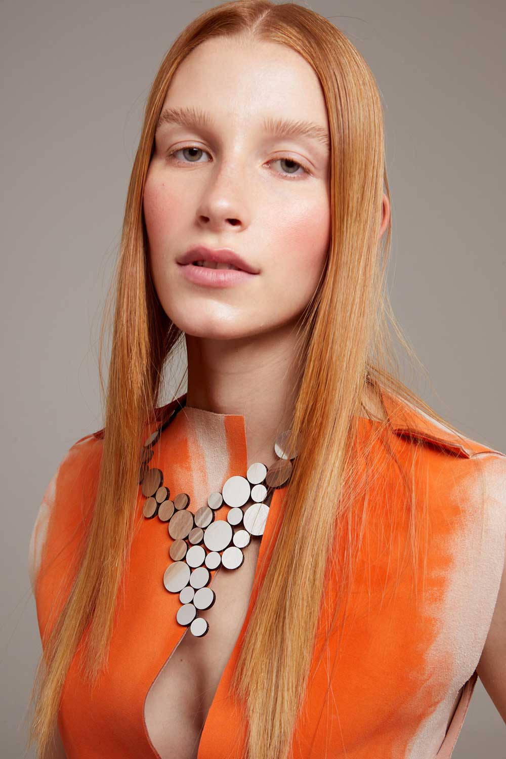 Abstraction V necklace in mirrored silver acrylic, worldwide best-seller by Iskin Sisters