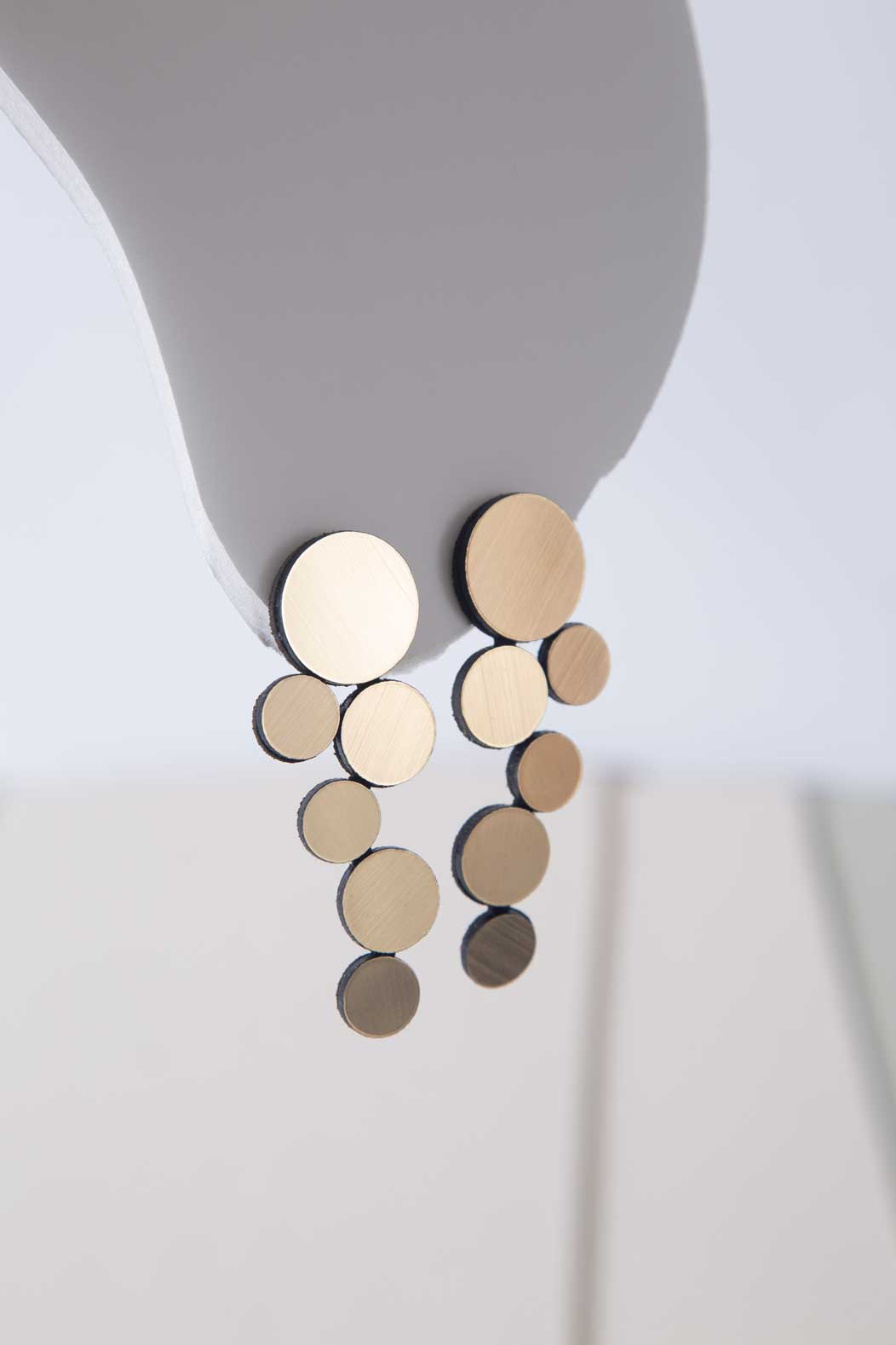 Large gold Abstraction clip-on earrings in mirrored acrylic, handmade contemporary jewelry by Iskin Sisters
