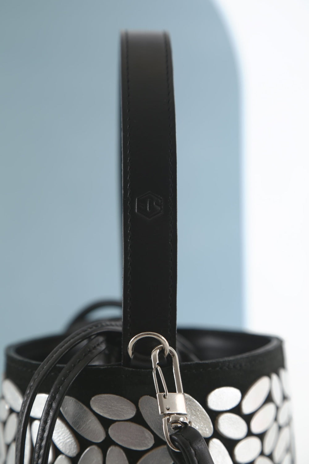 Silver leather bucket bag by Iskin Sisters, made by hand by artisans in Buenos Aires, Argentina
