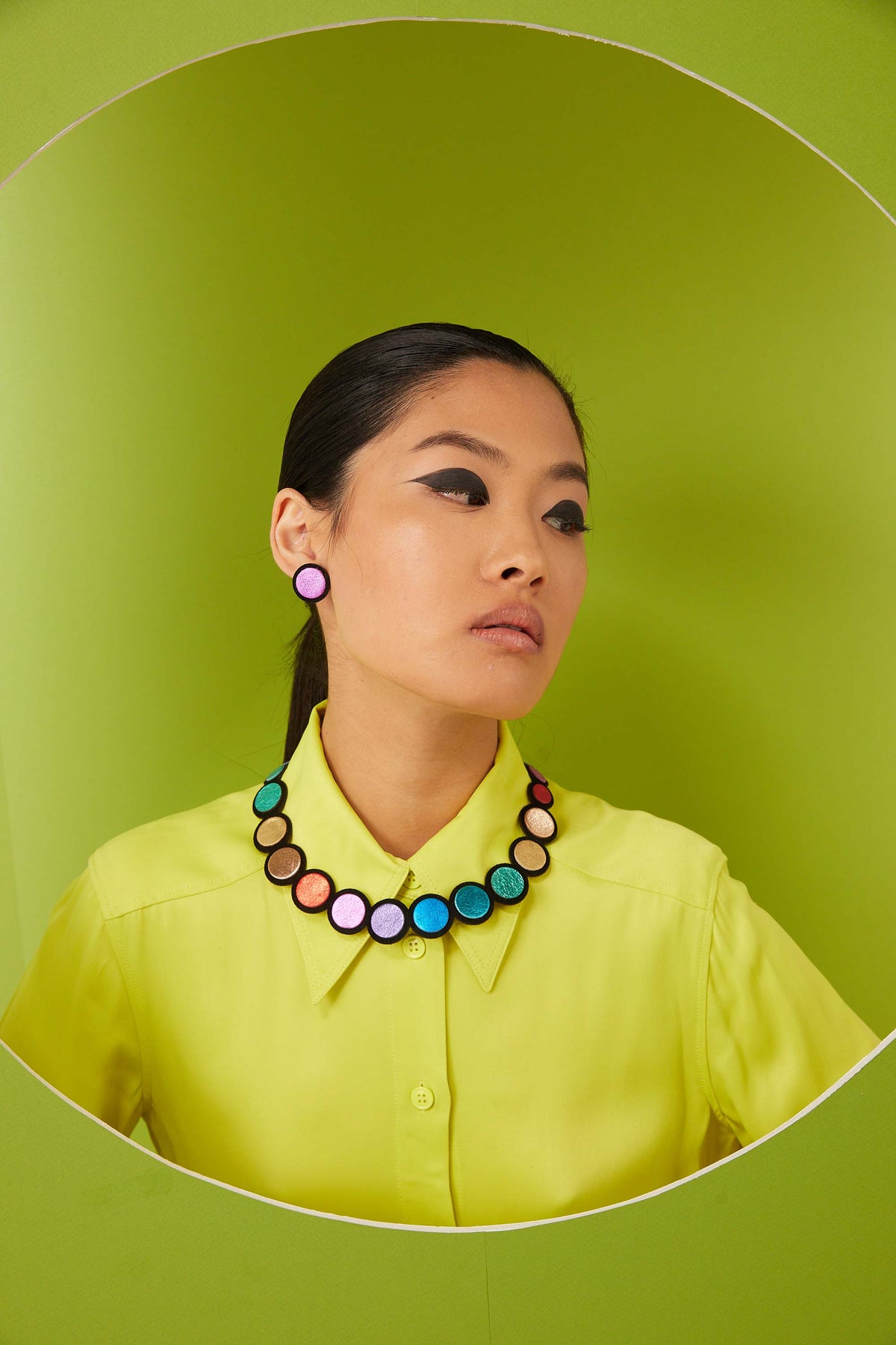 Multicolor leather small statement earrings from the Rainbow collection by Iskin Sisters, Argentina