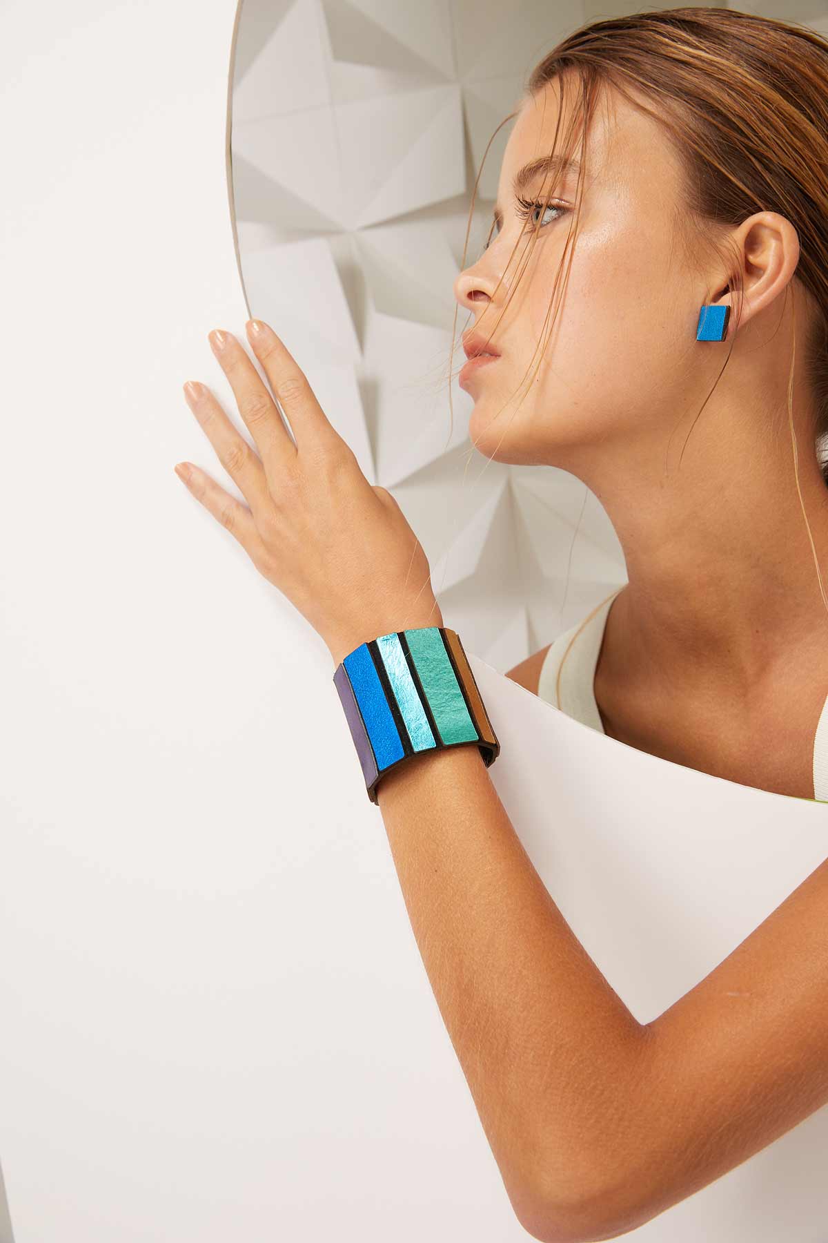 Colorful square statement earrings in leather by Iskin Sisters, made in our Buenos Aires atelier