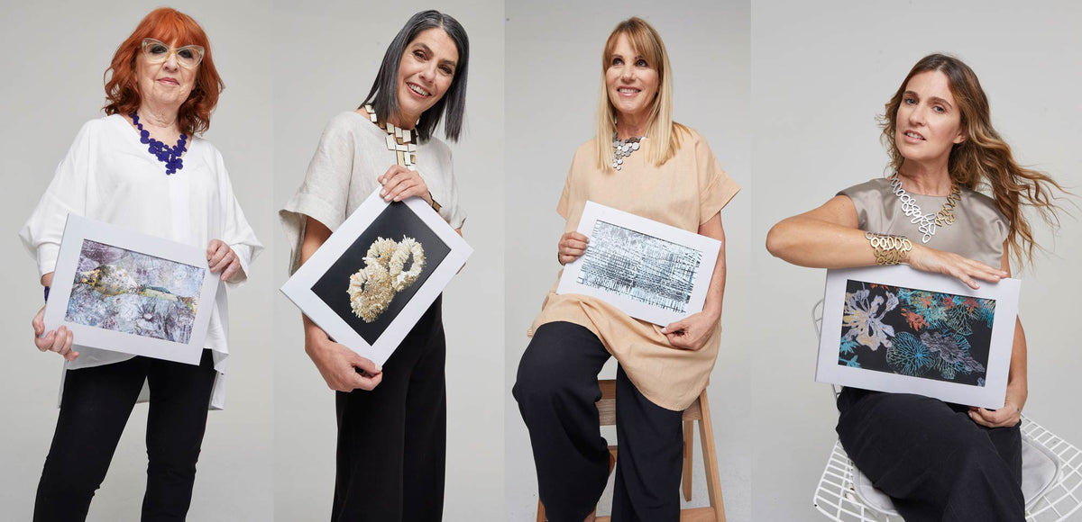 Nora Aslán, Mónica Fierro, María José Antelo and Guillermina Lynch holding their work as Iskin Sisters packaging