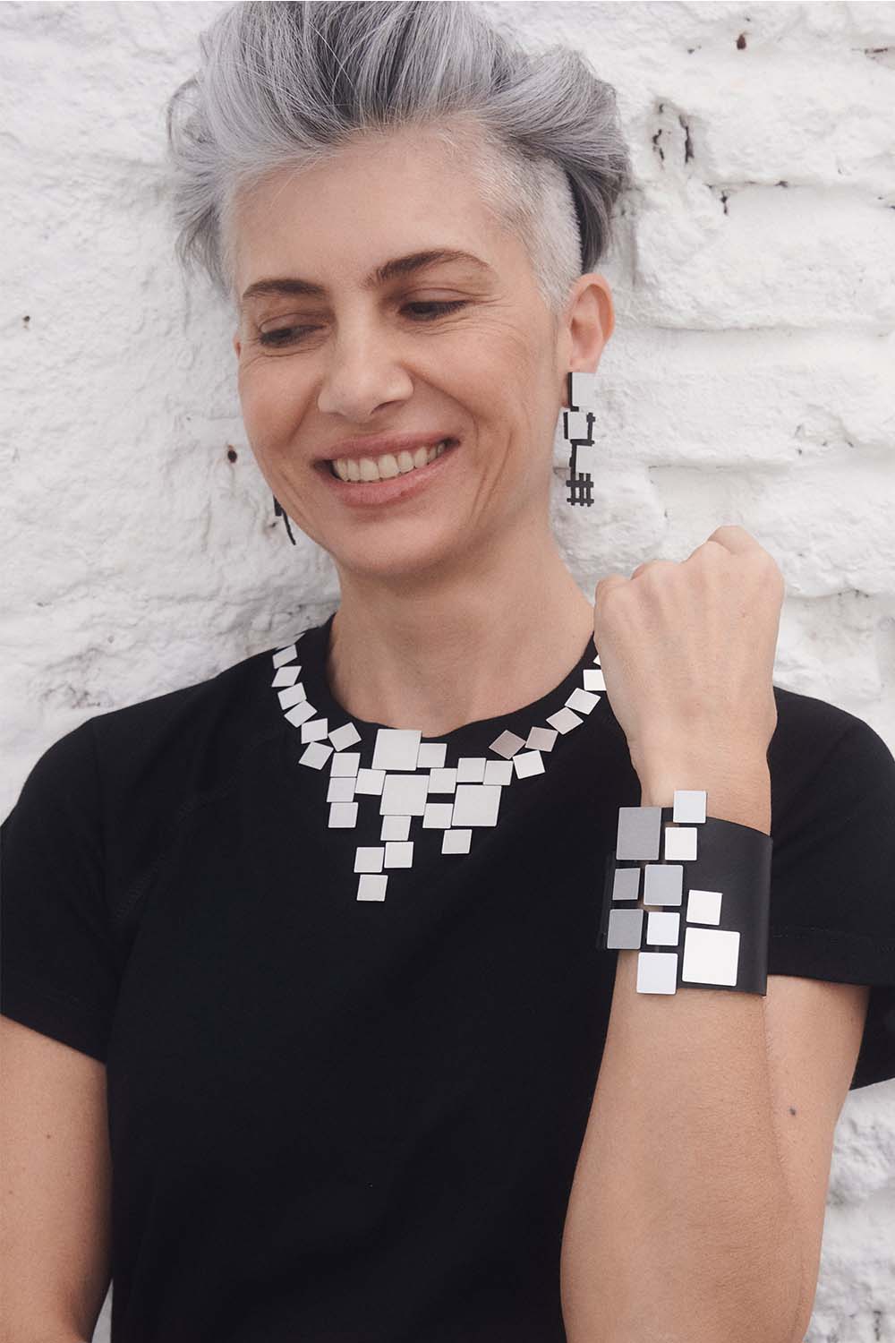 Silver acrylic square cuff bracelet with snap closure from the Bauhaus collection by Iskin Sisters