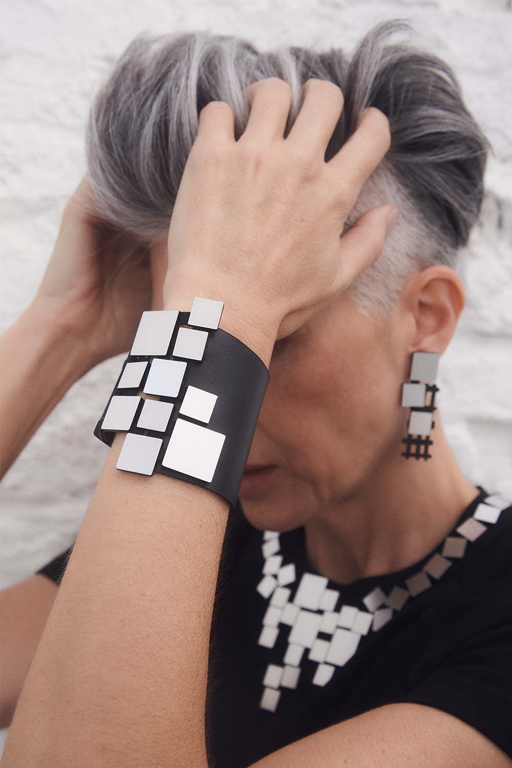 Bauhaus Bracelet Squares by Iskin Sisters in silver metallic acrylic and soft suede, Argentina