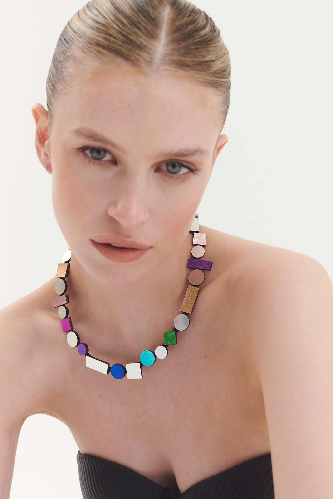 Bauhaus Necklace Round Rainbow by Iskin Sisters in multicolor acrylic and soft suede, Argentina