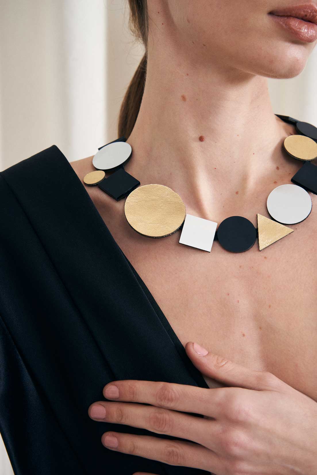 Bauhaus Geometric Necklace by Iskin Sisters in silver, black and gold acrylic with leather