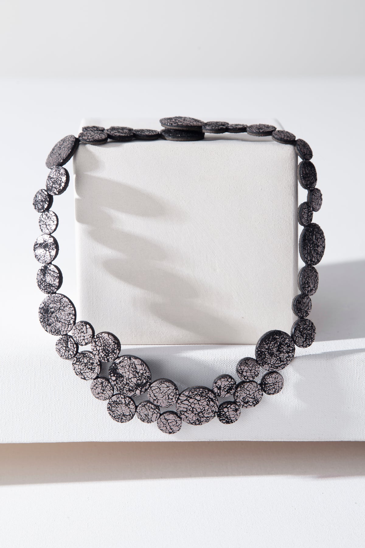Iskin Sisters Abstraction collection small necklace in crackled pewter leather, handmade jewelry
