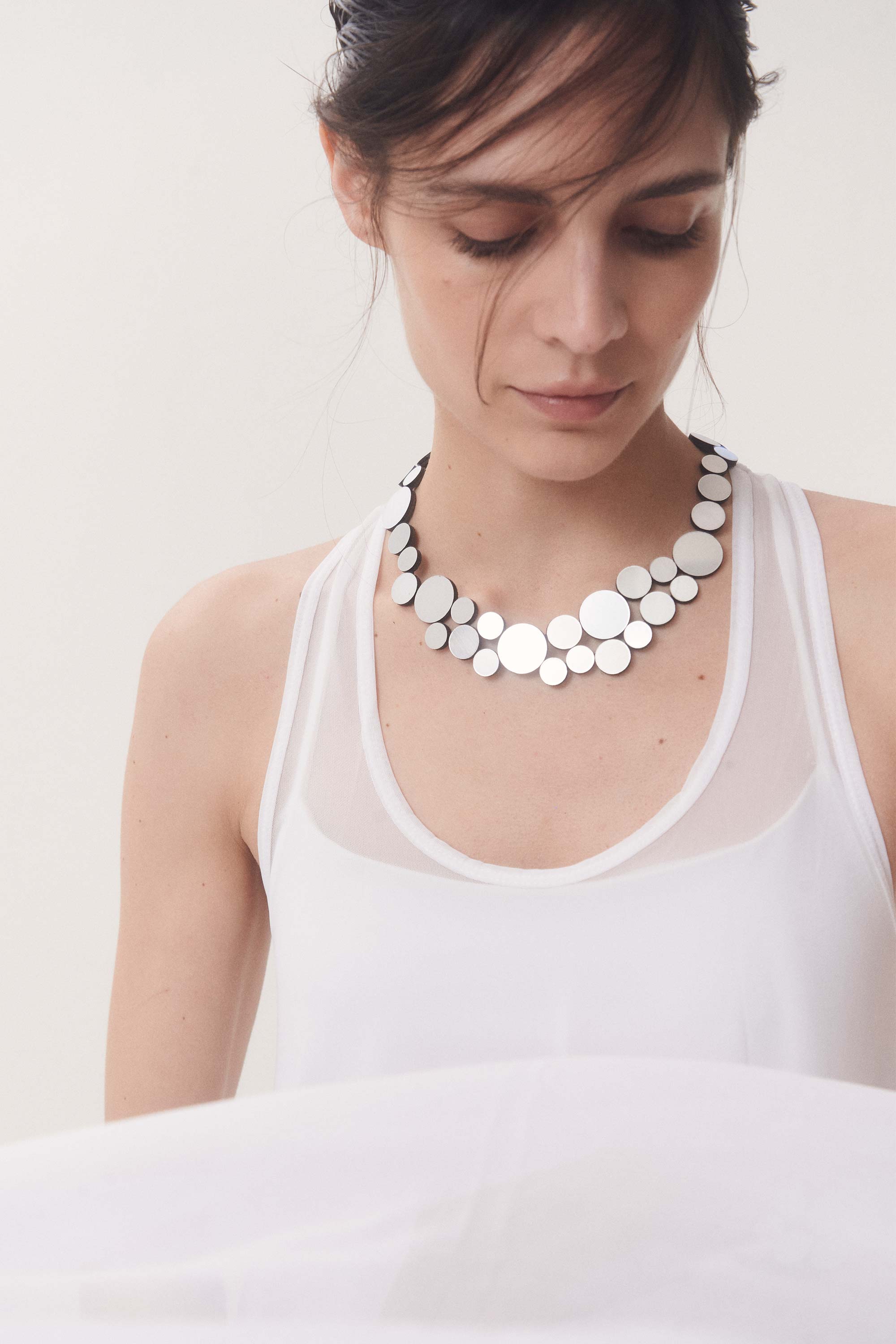 Iskin Sisters Abstraction collection small round necklace in silver acrylic, handmade jewelry