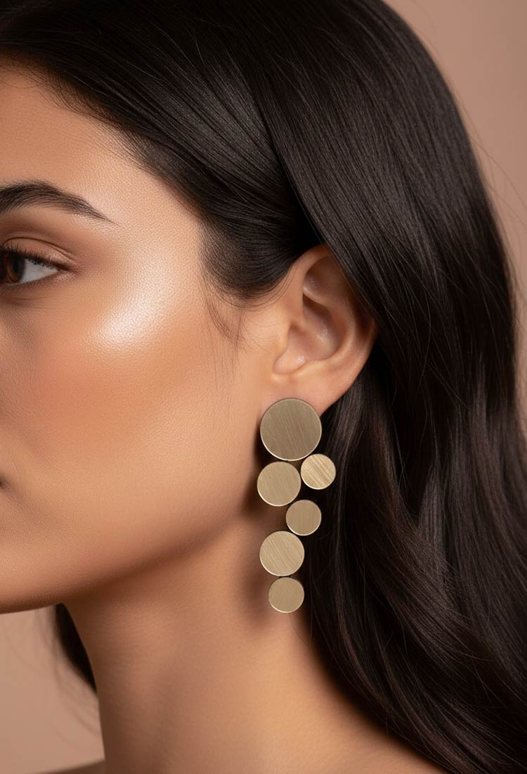 Abstraction large clip-on earrings in gold mirrored acrylic and suede, handmade in our Buenos Aires atelier