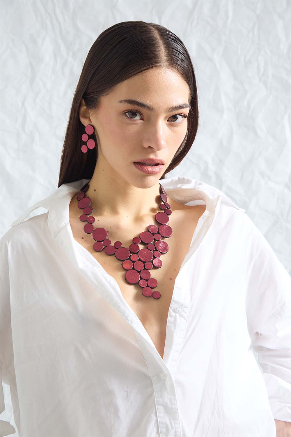 Burgundy Abstraction V necklace made in 100% Argentine leather, Iskin Sisters