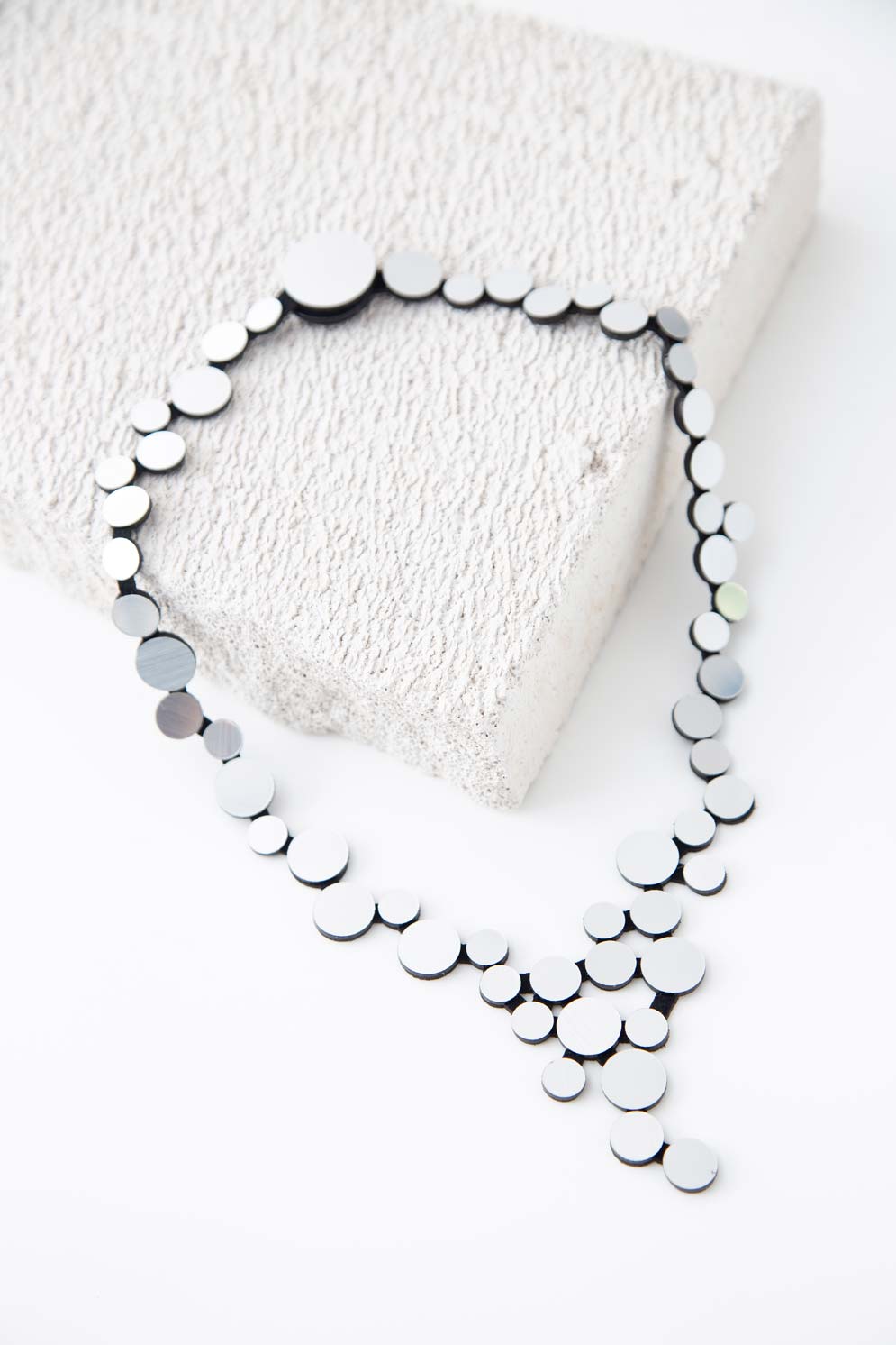 Iskin Sisters Abstraction collection small V necklace in silver acrylic, handmade contemporary jewelry