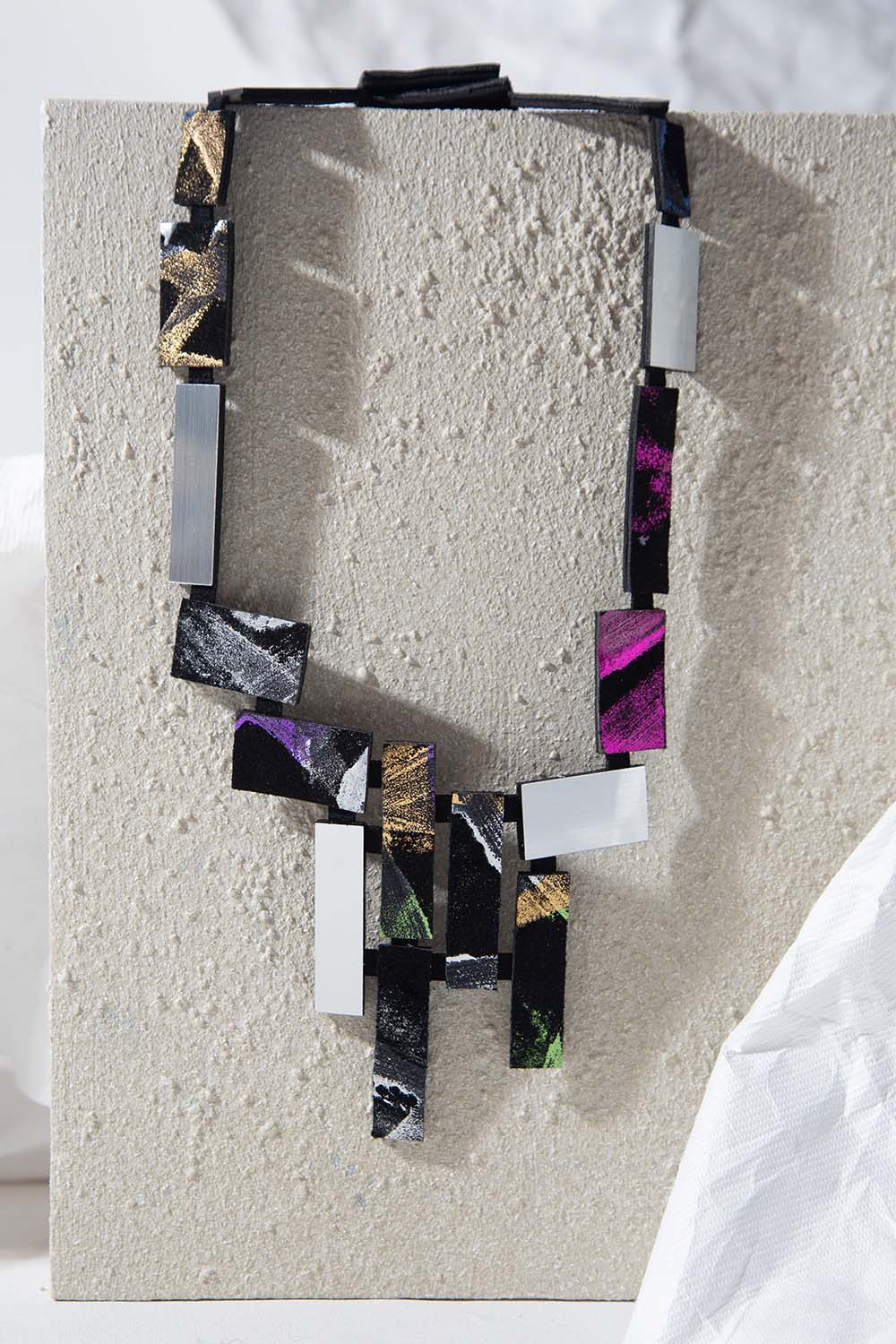 Iskin Sisters Klee collection V-shaped bib necklace in leather and painted acrylic, handmade jewelry