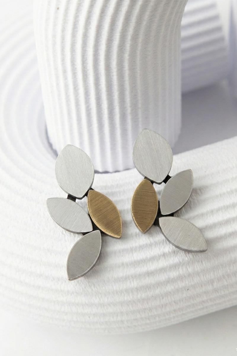 Kate Leaves medium clip-on earrings in silver and gold acrylic, nature-inspired jewelry by Iskin Sisters