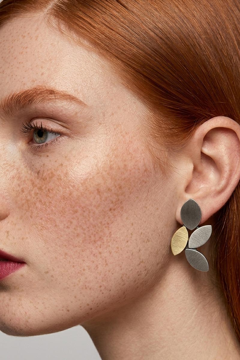 Silver and gold leaf clip-on earrings from the Kate collection, lightweight and comfortable
