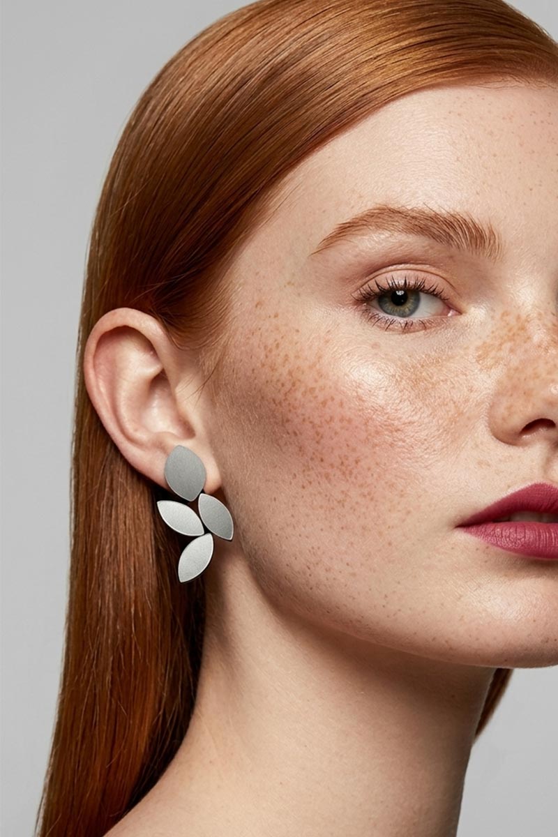 Silver leaf-shaped clip-on earrings, handmade in our Buenos Aires atelier