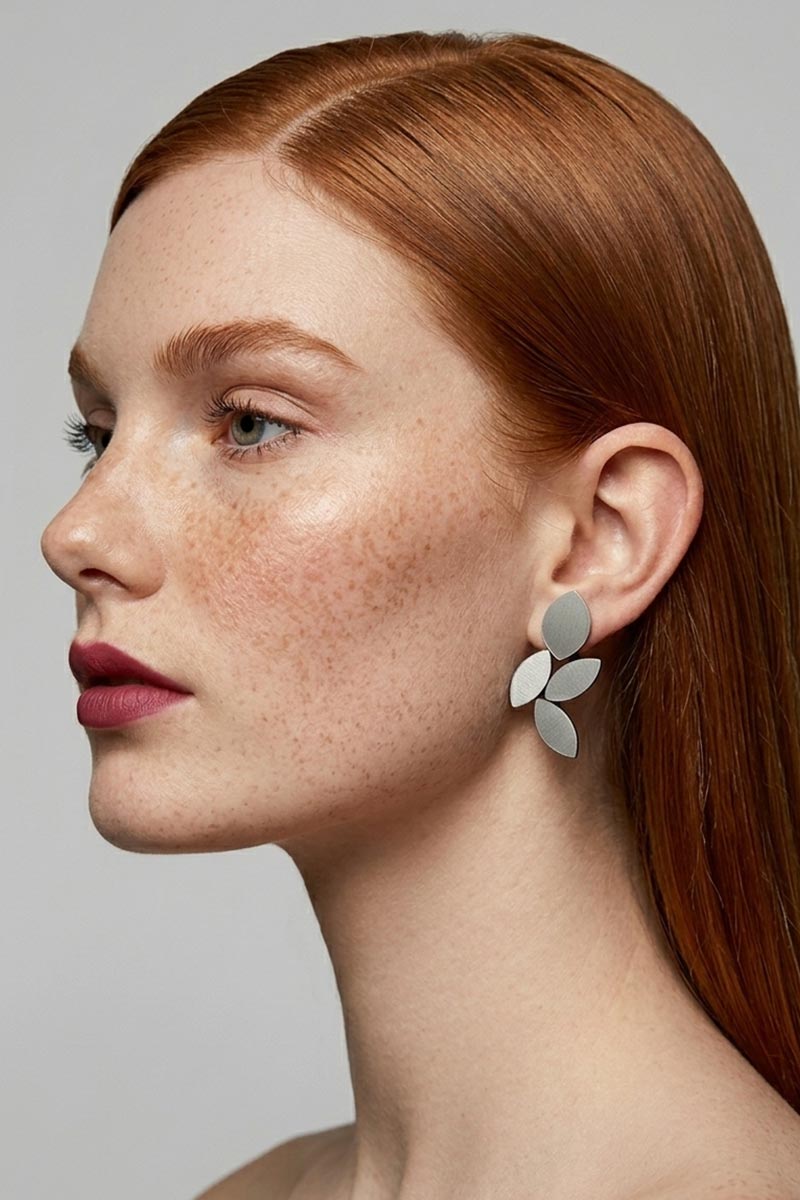 Medium silver leaf clip-on earrings from the Kate collection, lightweight and comfortable