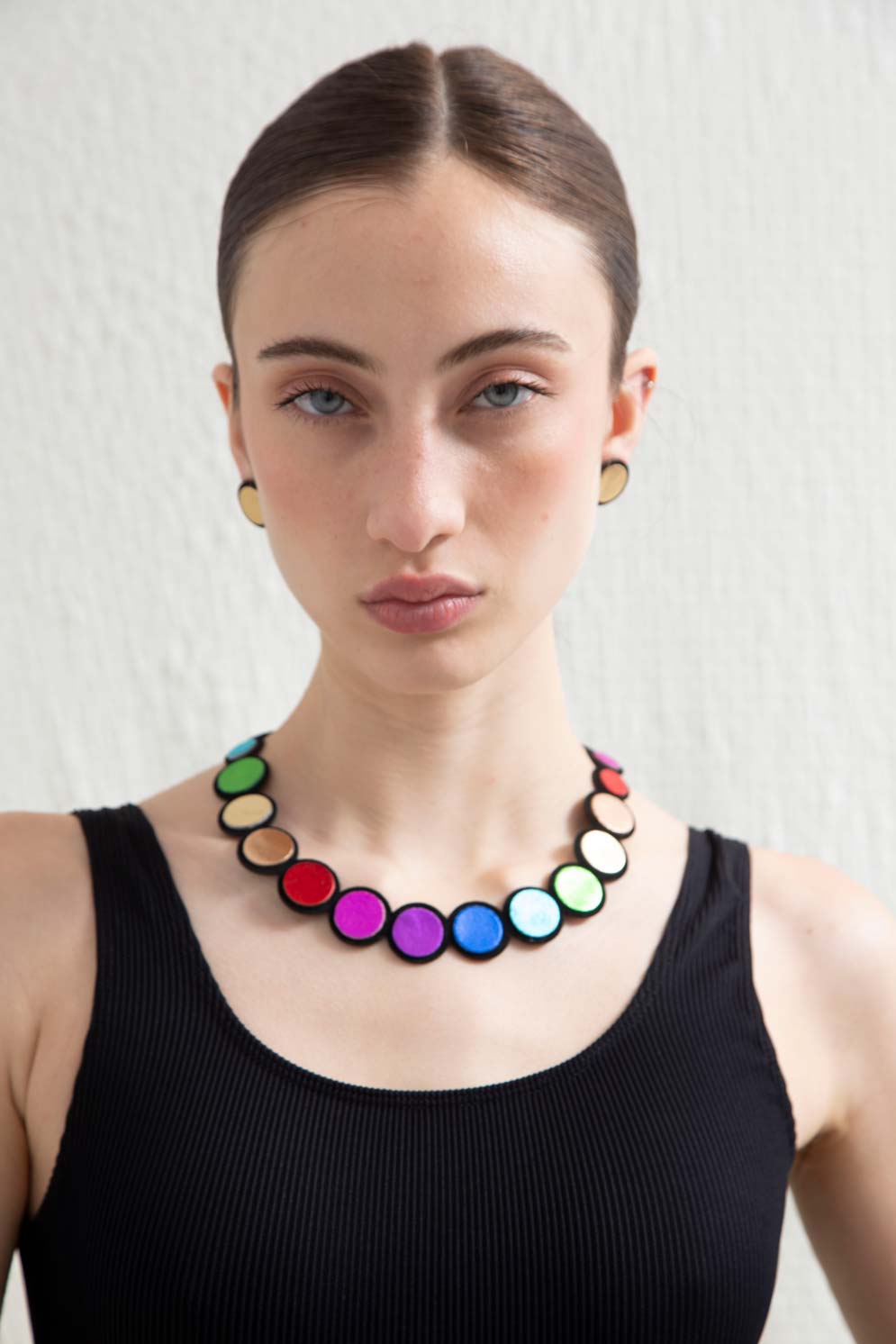 Rainbow Necklace by Iskin Sisters, a multicolor hand-cut leather bib necklace with magnetic clasp