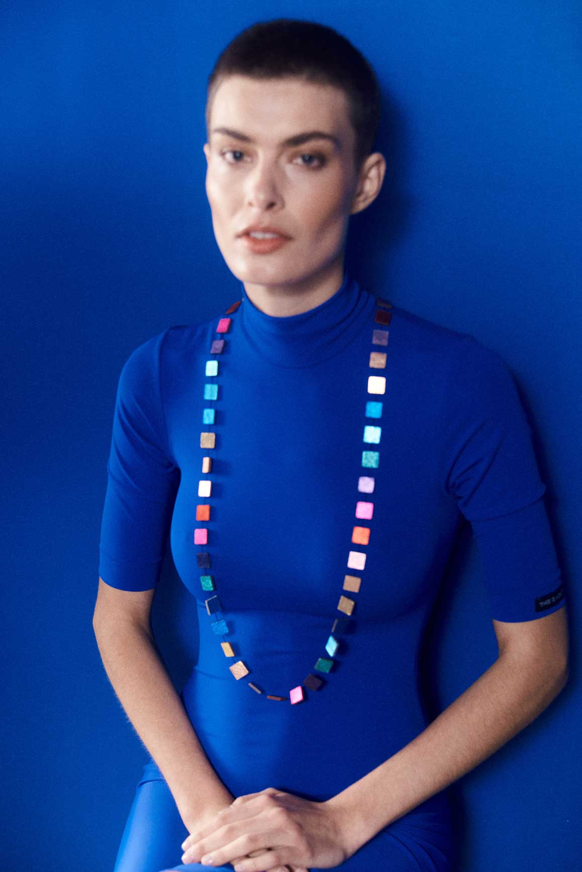 Slow-fashion long square rainbow leather necklace, contemporary jewelry by Iskin Sisters, Argentina