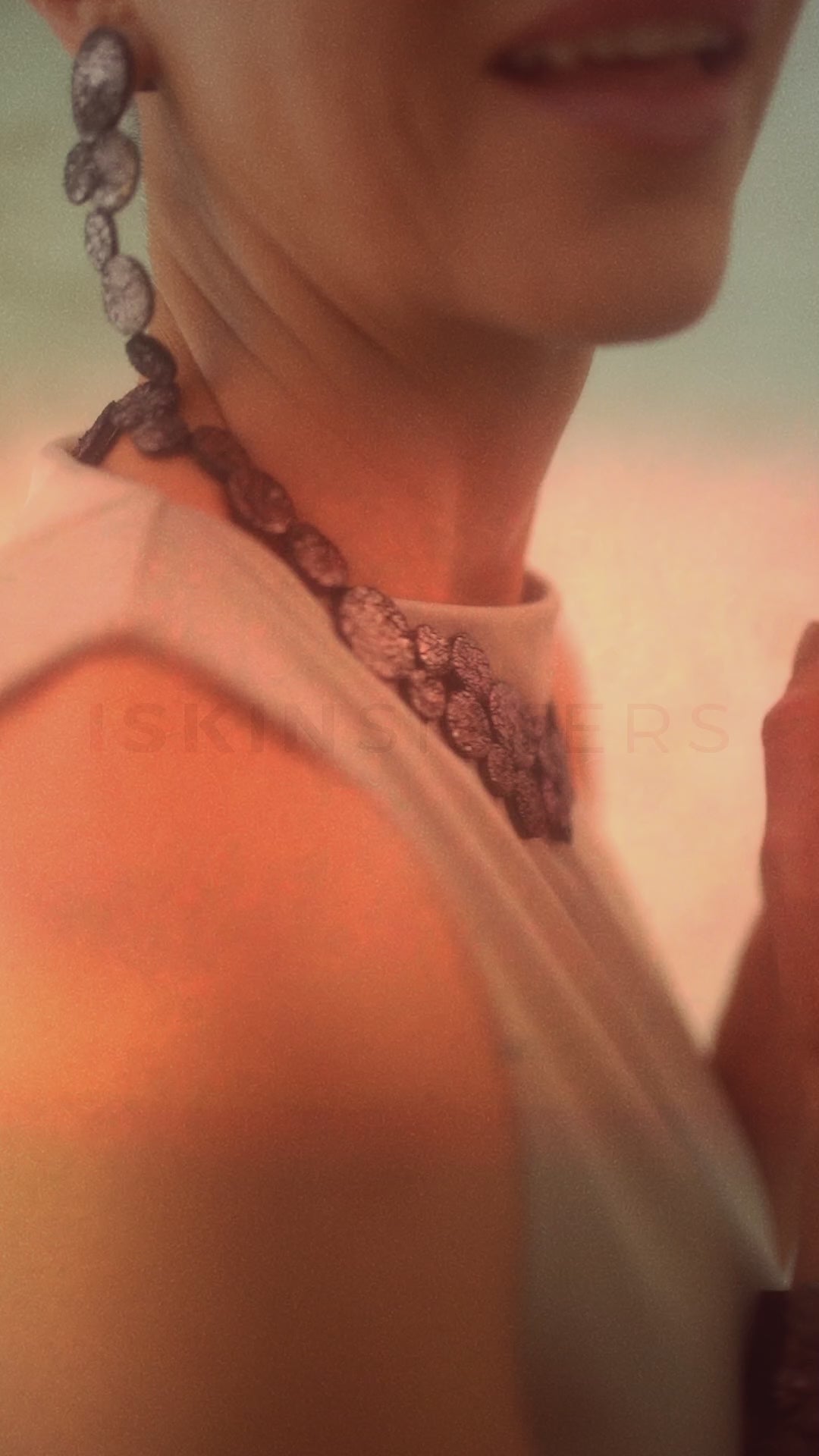 Video of the Abstraction necklace in crackled pewter leather