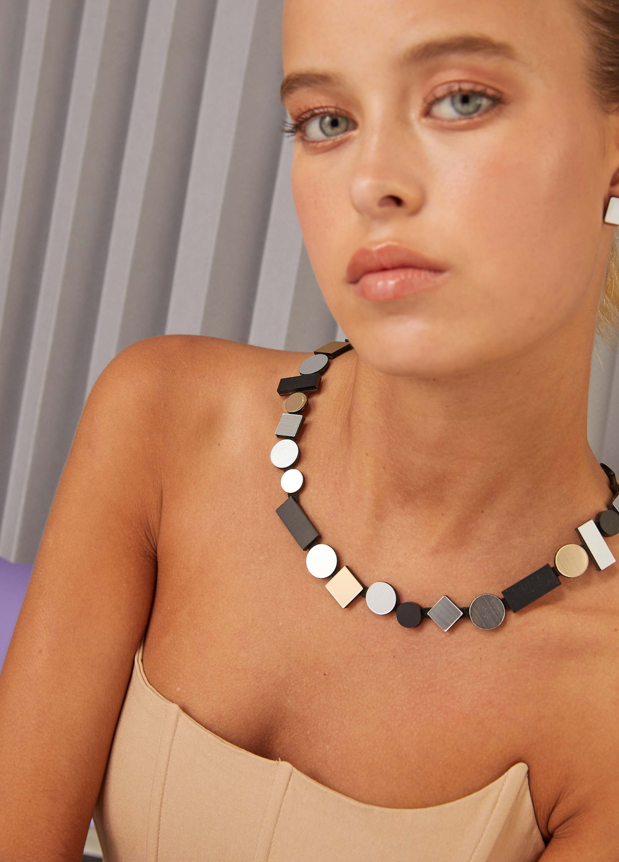 Contemporary round bib necklace in acrylic and soft suede, Bauhaus collection by Iskin Sisters