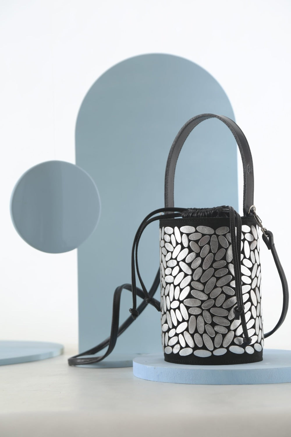 Emma Bucket Leather Bag by Iskin Sisters in silver hand-cut leather, handmade in Buenos Aires