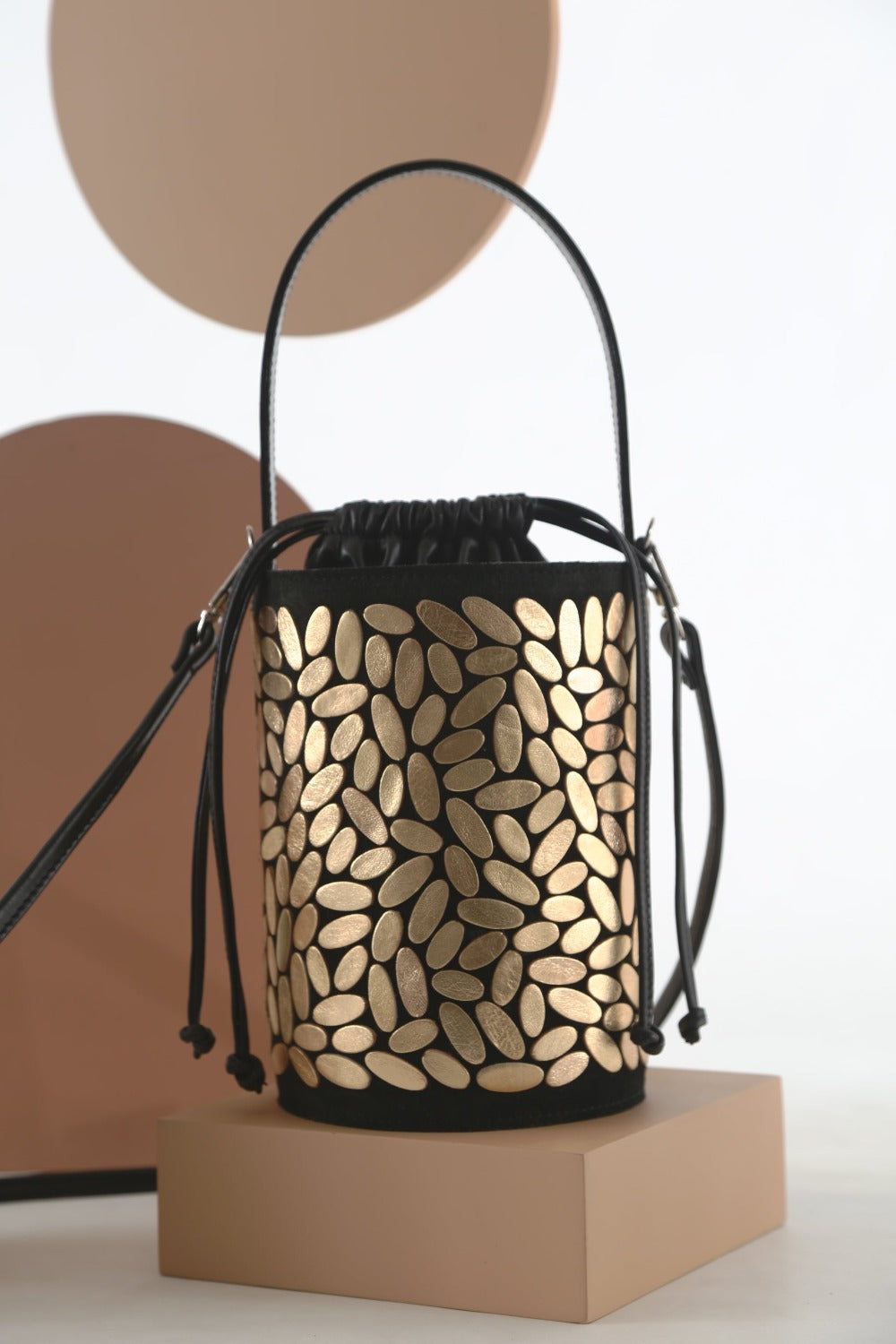Emma Bucket Leather Bag by Iskin Sisters in gold hand-cut leather, handmade in Buenos Aires