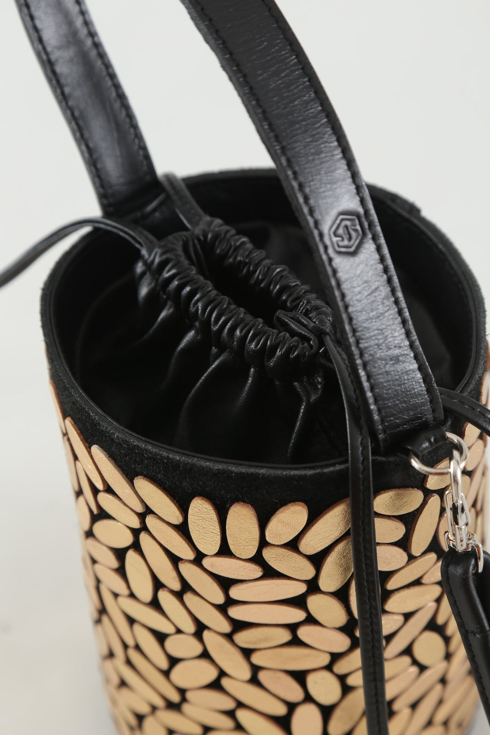 Emma collection gold leather bucket bag, contemporary handmade accessory by Iskin Sisters, Argentina