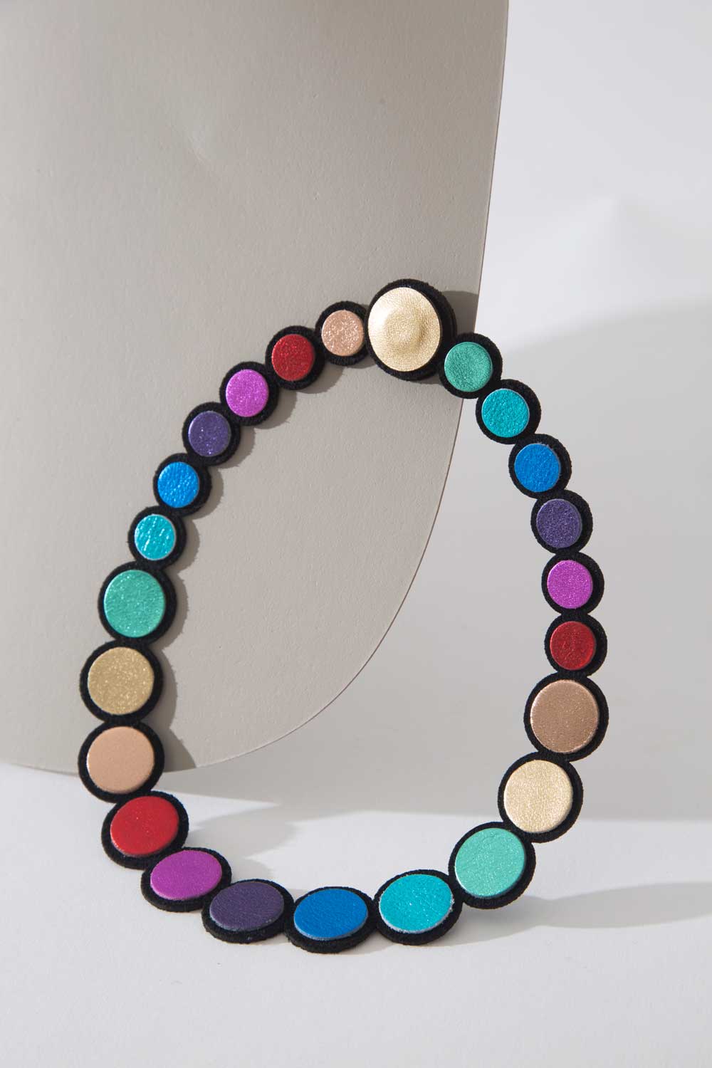 Iskin Sisters Rainbow bib necklace in multicolor leather, handmade contemporary jewelry from Buenos Aires